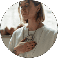 Elegant woman wearing bohemian jewelry and accessories, showcasing artistic fashion style.