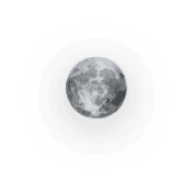 Moon at night with a dark sky and glowing halo.